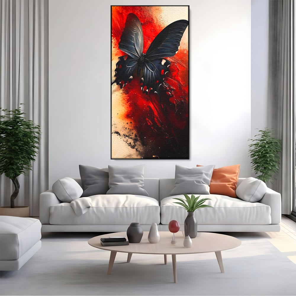 Tablou canvas cu tablou canvas cu fluture negru si fundal rosu, in rama de aluminiu negru, pe perete intr-un living
